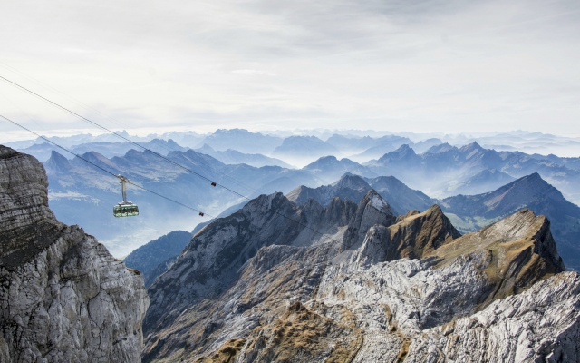 scenic landscape view from säntis in the swiss alps alpstein mountains panorama with cable car in foreground